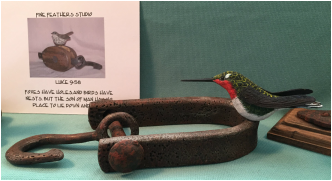 carved Humming bird Perched on antique tool by Vincent Ciesielski