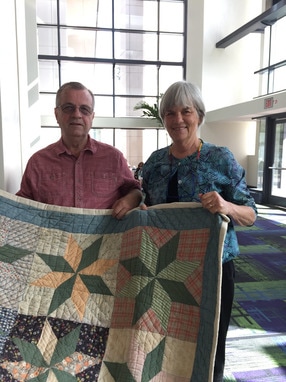 Jerry Hutchins and Merikay Waldvogel With Quilt From Jerry's Childhood at Quiltcon 2017